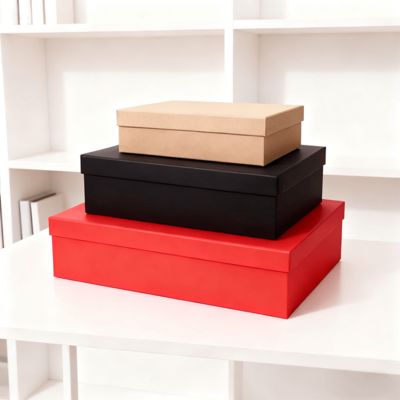 Juego de cajas de regalo planas de lujo personalizadas con tapa naranja y base con bolsa de papel. Características: Laminación mate, estampado en relieve, impresión con lámina dorada.