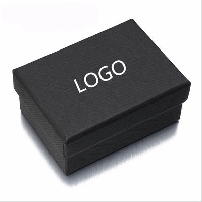 Caja de embalaje para regalos de color negro, de anillo rígido, etiqueta de puño y puño de regalo.
