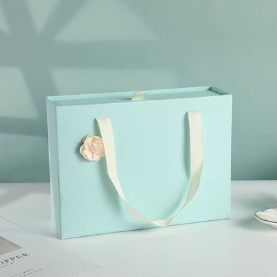 ODM OEM aceptable. Muestra gratuita portátil deslizador vacío de embalaje tipo cajón rígido Bolsa de regalo con cinta