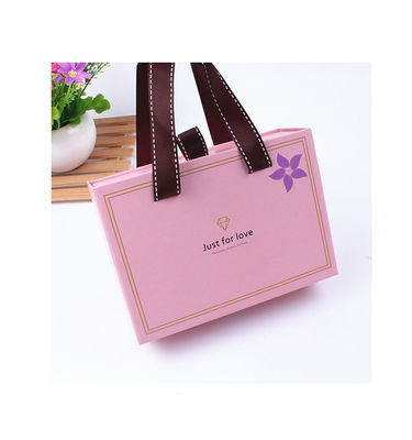 Tamaño personalizado Caja de embalaje de cajón pequeño Bolsas de regalo de papel con asas de cinta