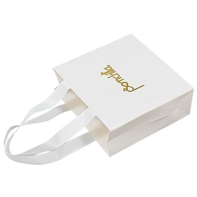 Bolsas de regalo de papel reciclado plegable personalizado Bolsas de papel boutique con asas