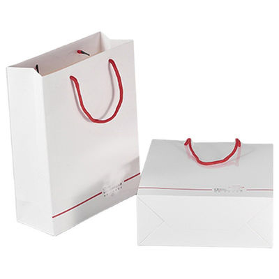 Pedido personalizado aceptable de lujo logotipo impresa bolsa de compras para un hermoso regalo navideño