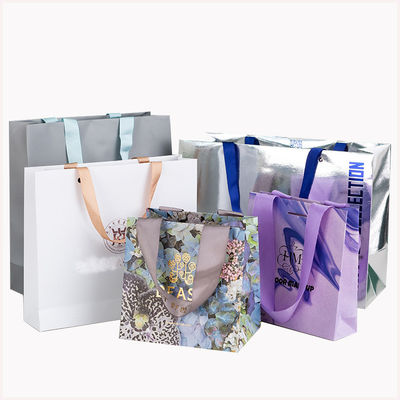 Pedido personalizado aceptable de lujo logotipo impresa bolsa de compras para un hermoso regalo navideño