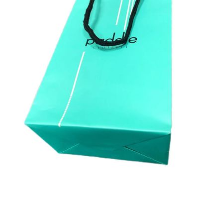 Bolsa de regalo de papel verde mate de lujo para el embalaje de ropa