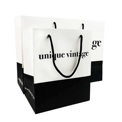 Logotipo personalizado Ropa de compras Regalo Joyería Embalaje Bolsa de papel con acabado de sello de oro