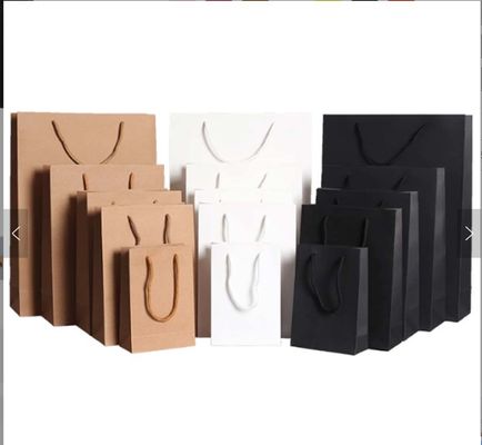 Bolsas de compras de papel Kraft marrón Impresión offset de ropa Bolsa de papel Logotipo personalizado
