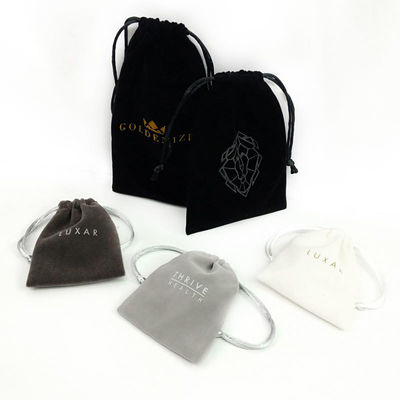Pedido personalizado Aceptado Estampado de oro de papel caliente de dibujo de cordón de terciopelo Bolso de joyería