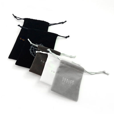 Pedido personalizado Aceptado Estampado de oro de papel caliente de dibujo de cordón de terciopelo Bolso de joyería
