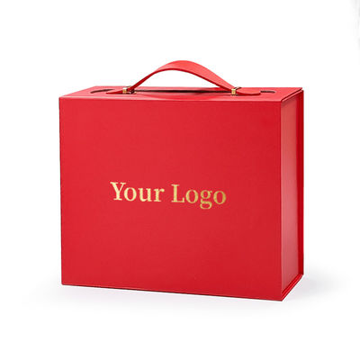 Caja de regalo con logotipo personalizado hecha de cartón reciclable exquisito con mango práctico de cuero