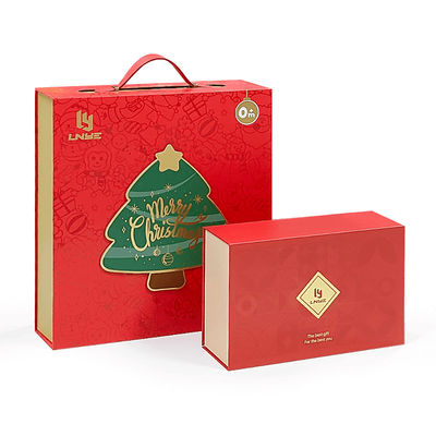 Caja de regalo de tema de Navidad de lujo rojo magnético personalizado de cerradura magnética rígida biodegradable envasado con mango