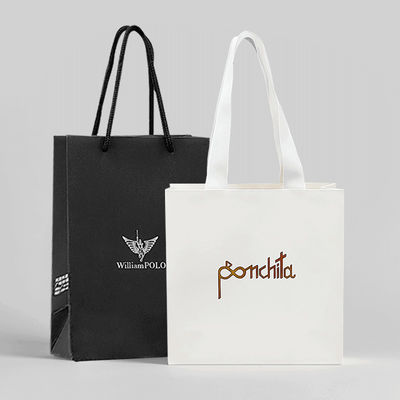 Bolsas de papel blanco y negro personalizadas para vestidos Comprar con su propio logotipo impreso