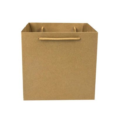 Tiendas de pequeñas empresas Logotipo personalizado Relieve de bolso de papel artesanal con mango de cinta