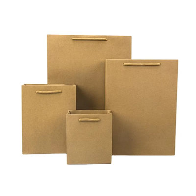 Tiendas de pequeñas empresas Logotipo personalizado Relieve de bolso de papel artesanal con mango de cinta
