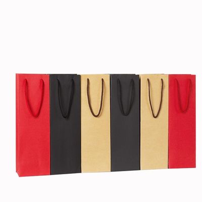 Tiendas de pequeñas empresas Logotipo personalizado Relieve de bolso de papel artesanal con mango de cinta