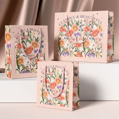 Bolsas de ropa personalizadas embalaje de lujo cartón de marfil cartón de papel Kraft bolsas de regalo de compras logotipo personalizado