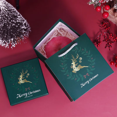 Lujo estilo de Navidad personalizado Embalaje de regalo respetuoso con el medio ambiente de cartón tapa superior roja caja de regalo de la cinta de Navidad