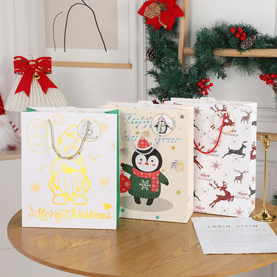 Bolsas de papel navideñas recicladas ecológicas verdes Soluciones de embalaje de regalos sostenibles para las fiestas
