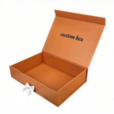 Bolsa de alta gama de lujo caja de regalo magnética logotipo personalizado ropa plegable embalaje con cinta